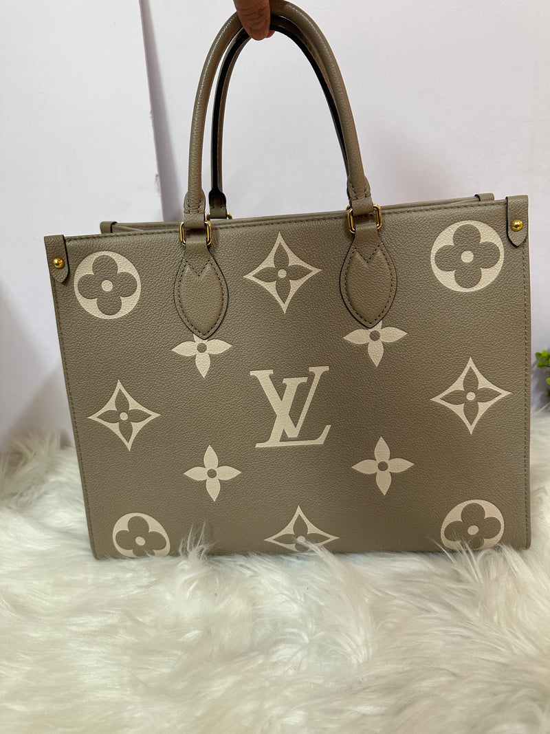 LOUIS VUITTON Empreinte On-The-Go MM Cream/Dove