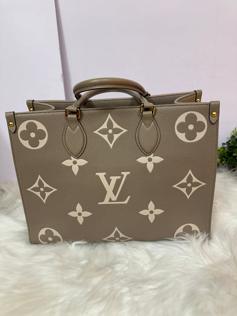 LOUIS VUITTON Empreinte On-The-Go MM Cream/Dove