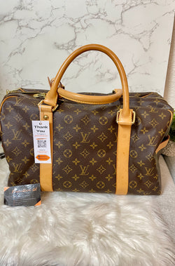 LOUIS VUITTON Monogram Canvas Caryall