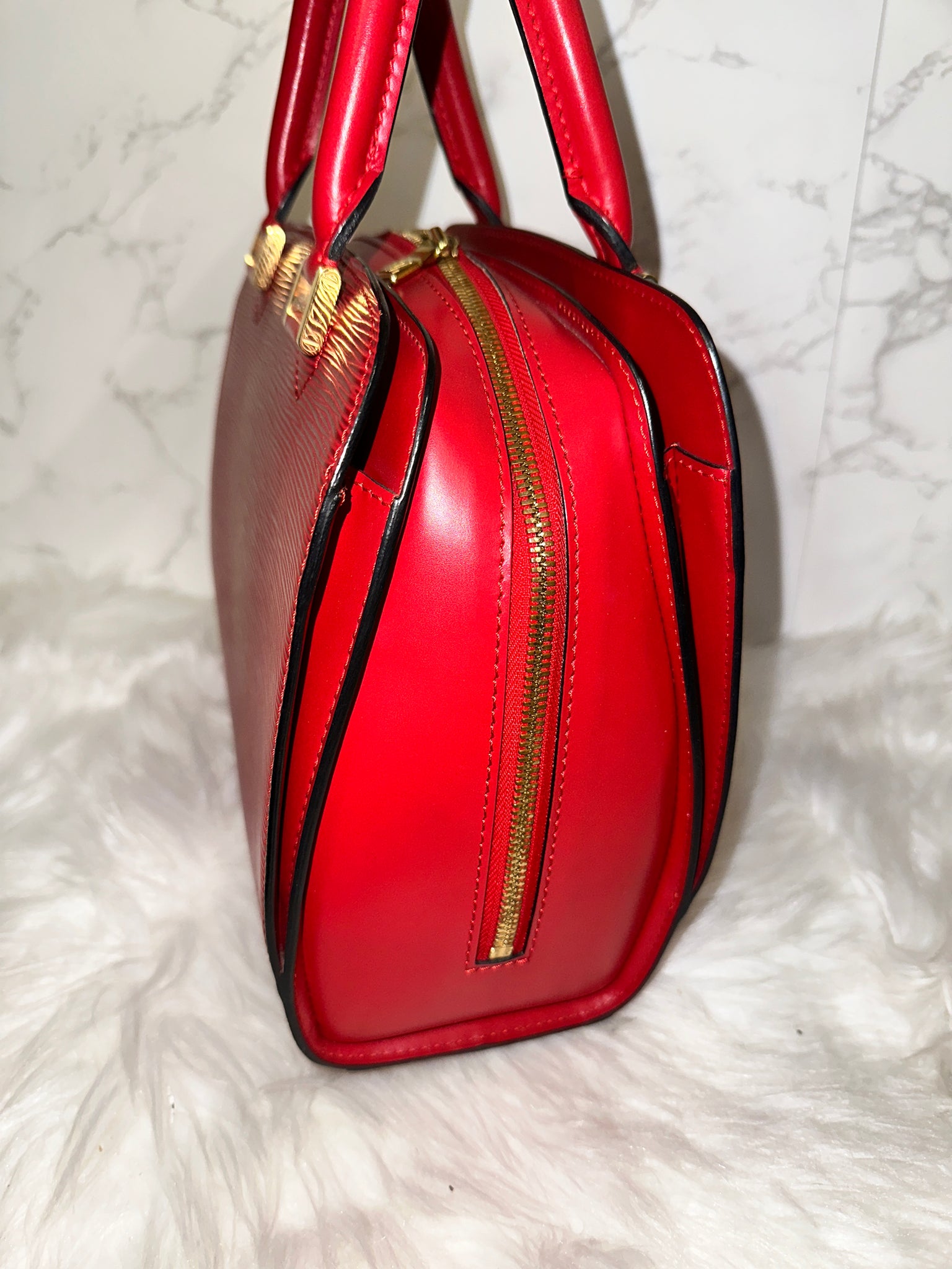Sold at Auction: Louis Vuitton, Louis Vuitton Red Epi Leather Pont-Neuf Handle  Bag