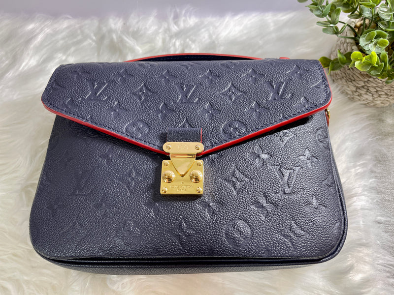 LOUIS VUITTON Blue Monogram Empreinte Leather Pochette Metis