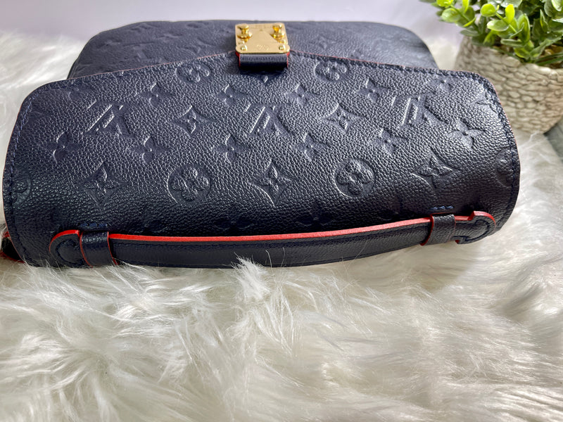 LOUIS VUITTON Blue Monogram Empreinte Leather Pochette Metis