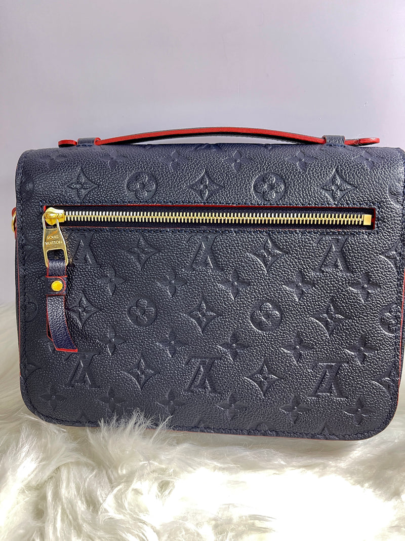 LOUIS VUITTON Blue Monogram Empreinte Leather Pochette Metis